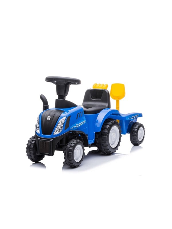 New Holland Lisensoitu -traktori perävaunulla